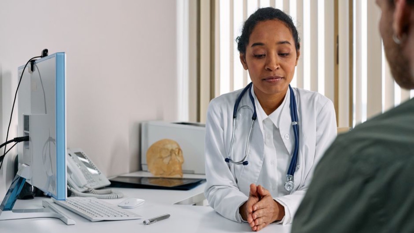 Photo: cottonbro studio / Pexels A woman talking with her physician
